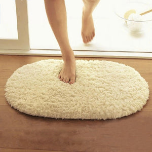 Modern oval rug with soft and plush microfiber texture and anti-slip back