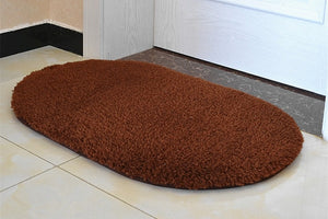 Modern oval rug with soft and plush microfiber texture and anti-slip back