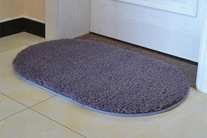 Modern oval rug with soft and plush microfiber texture and anti-slip back