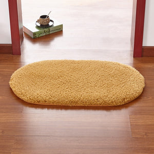 Modern oval rug with soft and plush microfiber texture and anti-slip back