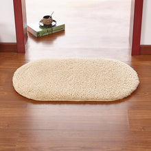 Modern oval rug with soft and plush microfiber texture and anti-slip back